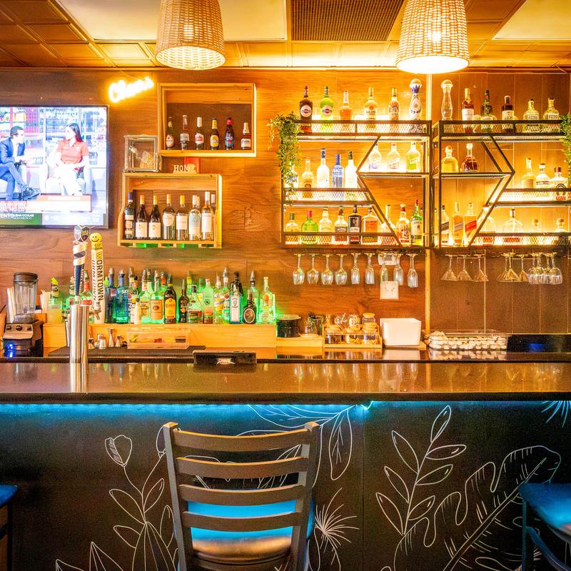 Bar interior at Delicias Colombianas during evening service